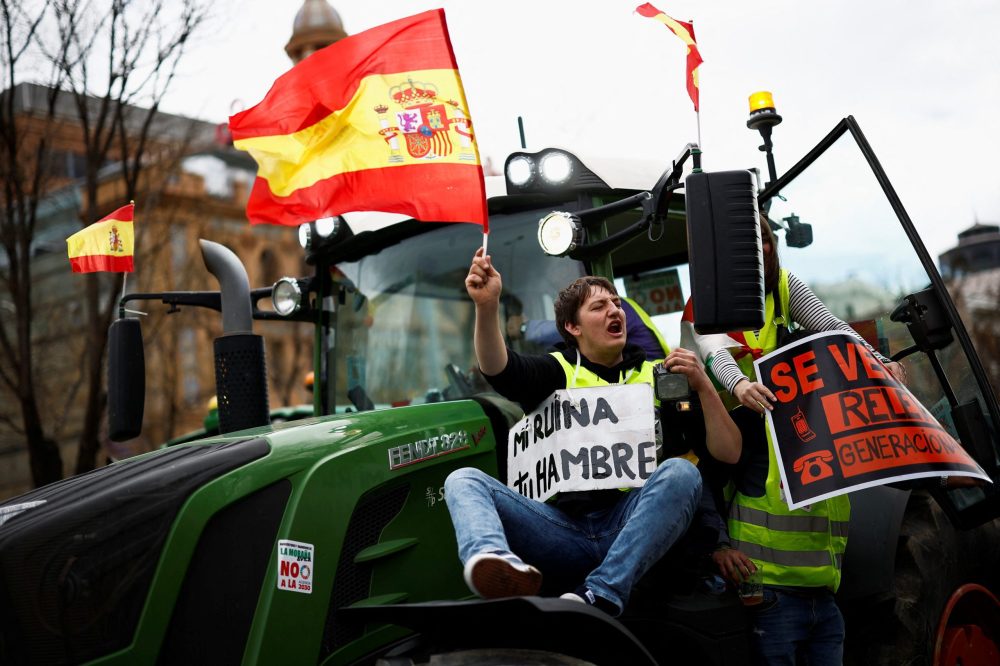 A demonstrator reacts as Spanish farmersprotest over price pressures, taxes and green regulation and grievances shared by farmers across Europe, in Madrid, Spain, February 26, 2024. REUTERS/Juan Medina
