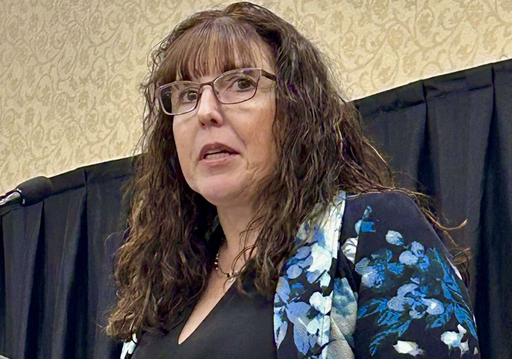 LeeAnn Peters of Maple Leaf Foods speaks at the 2024 Swine Seminar in Winnipeg.
