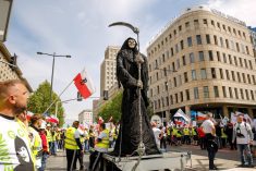 Protesters lead a model of reaper as Solidarity organisation and Polish farmers protest with Polish  and Solidarity flags and anti Green Deal banners in front of European Parlament building in the centre of Warsaw, the capital of Poland on May 10, 2024. The protest in Poland is part of the European farmers’ protest against the EU’s Green Deal regulations. Polish farmers also demand a change to the EU agreement with Ukraine regarding the import of agricultural produce to the EU. The protest gathered over 100 thousand people. (Photo by Dominika Zarzycka/Sipa USA)