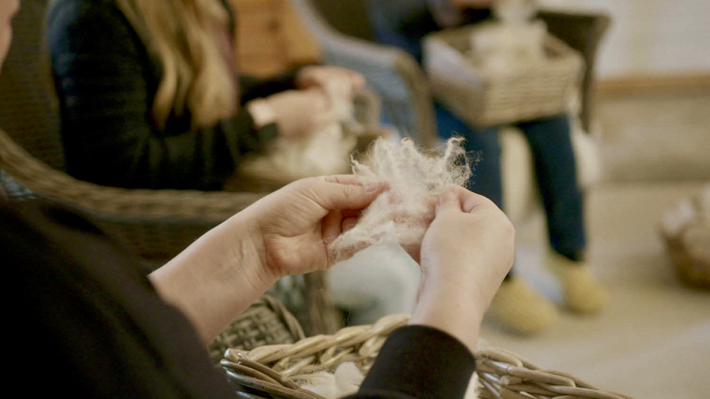 Visitors learn the process of making wool at Green Pastures Farm.