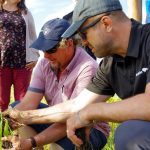 Field day attendees check out soil health gains at the Robins farm in western Manitoba in 2019.