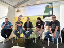 Herbicide resistance discussion panel at the Bayer Crop Science booth at Ag in Motion on Tuesday, July 16. Left to right: Ashley Smith (moderator), Rory Cranston, Chris Mansiere, Shaun Sharpe, Corey Loessin. 
