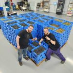 Co-owners Zach Isaacs (left) and Chris Willows posing with the fruits of their labour at Shrugging Doctor Beverage Company's Winnipeg facility. Photo: Shrugging Doctor