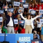 Kamala Harris and Tim Walz at a campaign rally