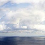 The Pacific Ocean under a cloudy sky.