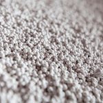 Close-up of white granules of phosphoric fertilizers on fertilizers factory.