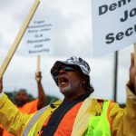 Port workers from the International Longshoremen’s Association (ILA) participate in a strike outside the Norfolk International Terminal (NIT) in Norfolk, Virginia, U.S., October 1, 2024. REUTERS/Jose Luis Gonzalez
