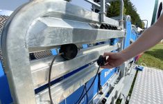The "magic eye" sensors magnetically affix on the Racewell HD4 chute allowing for easy adjustment to match the livestock's size during Canada's Outdoor Farm Show in Woodstock, Sept. 11, 2024.