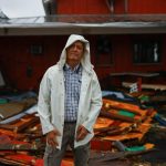 Jeff Schorner poses for a photo next to his business, Al’s Family Farms, which he lost during Hurricane Milton, in Lakewood Park, near Fort Pierce, in St. Lucie County, Florida, U.S., October 11, 2024. REUTERS/Jose Luis Gonzalez
