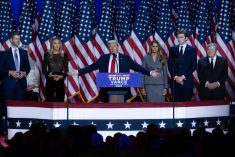 Surrounded by family members and supporters, Donald Trump makes his acceptance speech at his Election Night Watch Party at the Palm Beach County Convention Center after being elected the 47th President of the United States November 5, 2024. Photo: USA TODAY NETWORK via Reuters Connect
