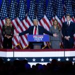 Surrounded by family members and supporters, Donald Trump makes his acceptance speech at his Election Night Watch Party at the Palm Beach County Convention Center after being elected the 47th President of the United States November 5, 2024. 