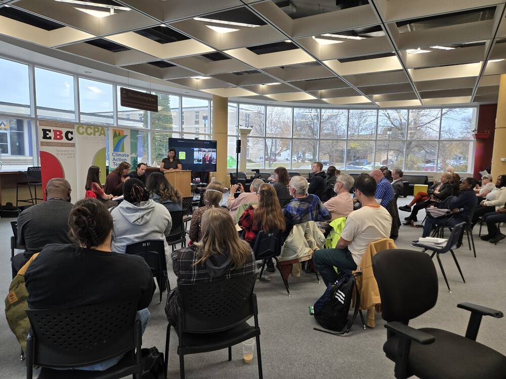 A group of community members attend a presentation by the Climate Action Team, a policy group in Manitoba, about strengthening public transportation options in the province at Brandon University on Oct. 18.