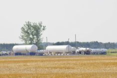Anhydrous ammonia fertilizer tanks parked on a lot in southern Manitoba. Fertilizer emissions have been one target of federal greenhouse gas policy.