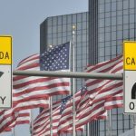 Canada/U.S. border signage in downtown Detroit. (RiverNorthPhotography/Getty Images)