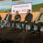 (left-right) Panel moderator Marc Zienkiewicz, SeCan’s Todd Hyra, University of Saskatchewan researcher Stuart Smyth, retired AAFC breeder Robert Graf and Canadian Wheat Research Coalition chair Dean Hubbard discuss what happens if Agriculture and Agri-Food Canada bowing out of field-ready wheat development during the CrossRoads Crop Conference Jan. 28-29 in Edmonton.
