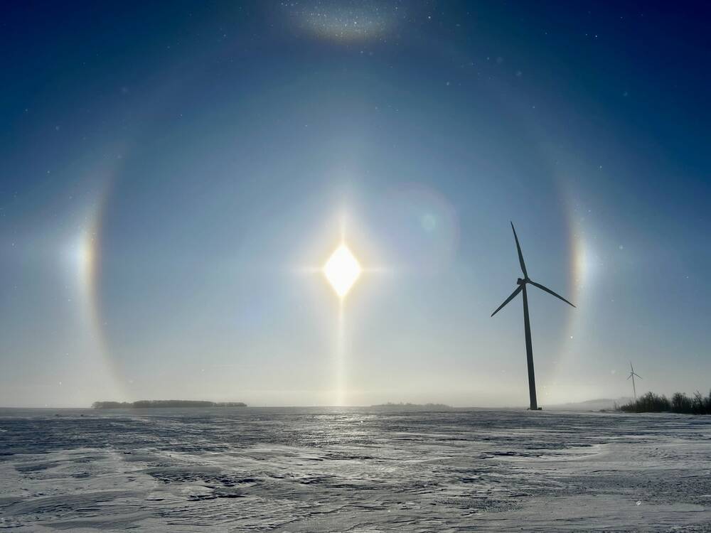 Sun dogs appear in the sky near St. Leon, Man., on a frigid winter morning Feb. 8 as extreme cold warnings blanket the western half of Manitoba.