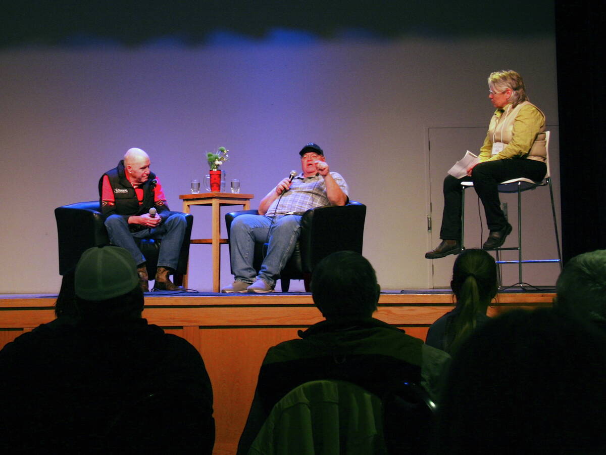 Speakers Gabe Brown (right) and Don Campbell take the stage during a holistic management conference in Assiniboia, Sask.