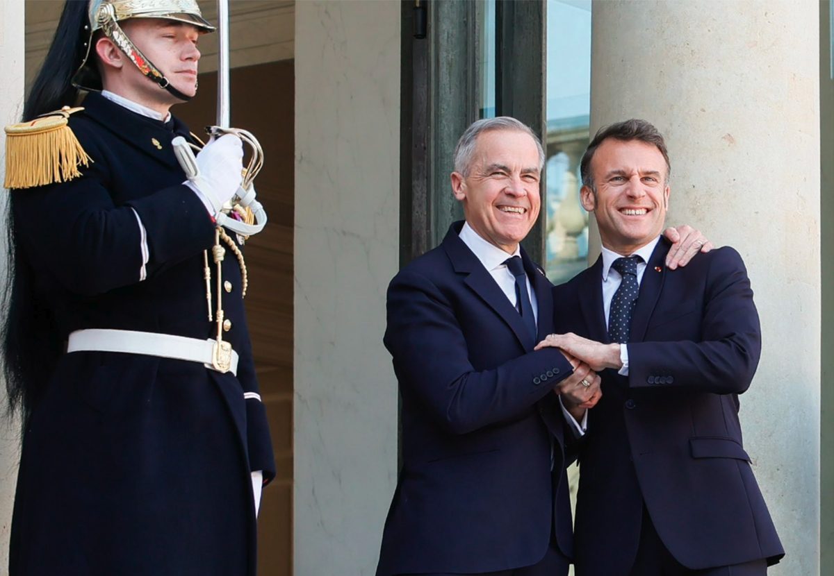 Prime Minister Mark Carney is warmly greeted by French president Emmanuel Macron on his first trip abroad as Canadian Prime Minister. Photo: Screencap via x.com/@EmmanuelMacron
