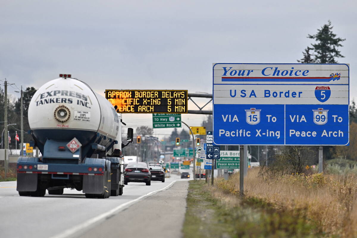Commercial trucks head towards a U.S. 
port of entry south Surrey, British Columbia. 