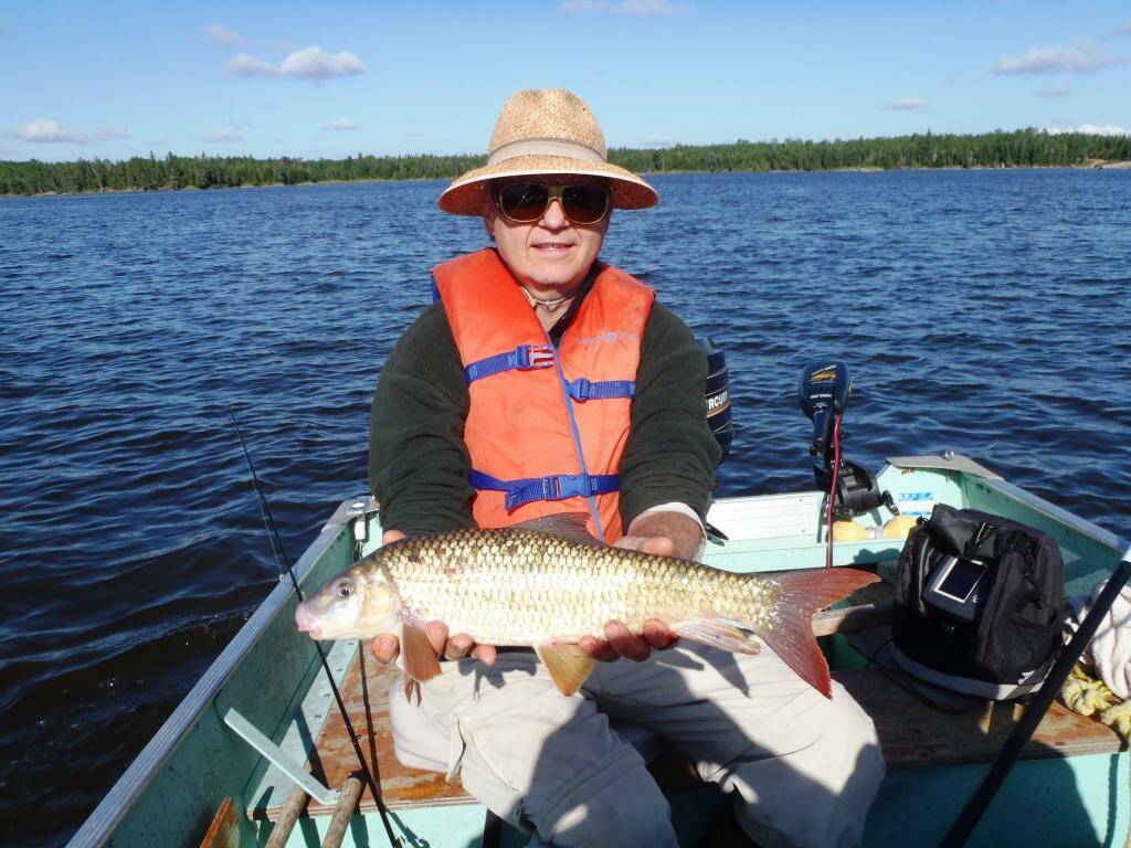 Fishing deep and close to the bottom can land some interesting surprises. Tim Sopuck shows off one redhorse sucker caught with a slip bobber. Photo: Tim Sopuck
