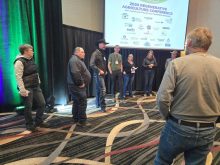 Attendees at last year’s MFGA Regenerative Agriculture Conference discuss fencing options for grazing livestock.
