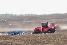 Farmers seeding near Notre Dame de Lourdes race the forecast May 14, just before a major rain system dropped over 60 millimetres of rain on the region.