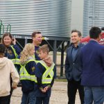 Pierre Poilievere at Sixteen Grains near Saskatoon, Sask. speaking to one of the farm owners. Photo: Janelle Rudolph
