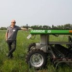 Stefan Graner with his FarmDroid seeder and weeder at his farm near Paddockwood, Sask. Photo: Janelle Rudolph