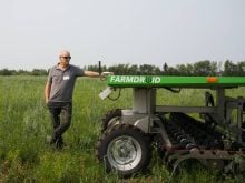 Stefan Graner with his FarmDroid seeder and weeder at his farm near Paddockwood, Sask. Photo: Janelle Rudolph