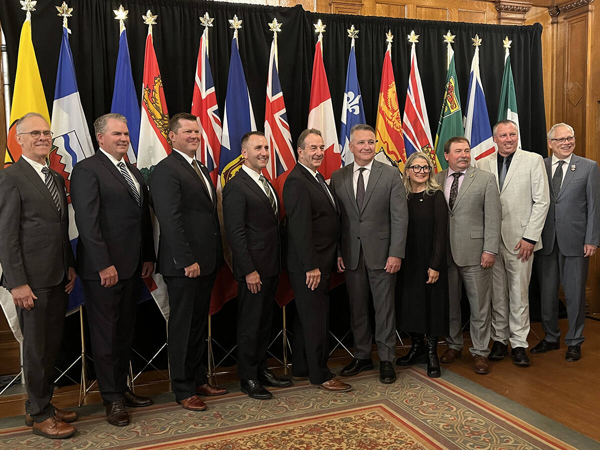From left: New Brunswick agriculture minister Pat Finnigan, PEI minister Bloyce Thompson, Alberta minister RJ Sigurdson, Ontario minister Trevor Jones, Manitoba minister Ron Kostyshyn, federal minister Heath MacDonald, BC minister Lana Popham, Sask. minister Daryl Harrison, Nova Scotia Greg Morrow and John Streicker from Yukon. Photo: Karen Briere