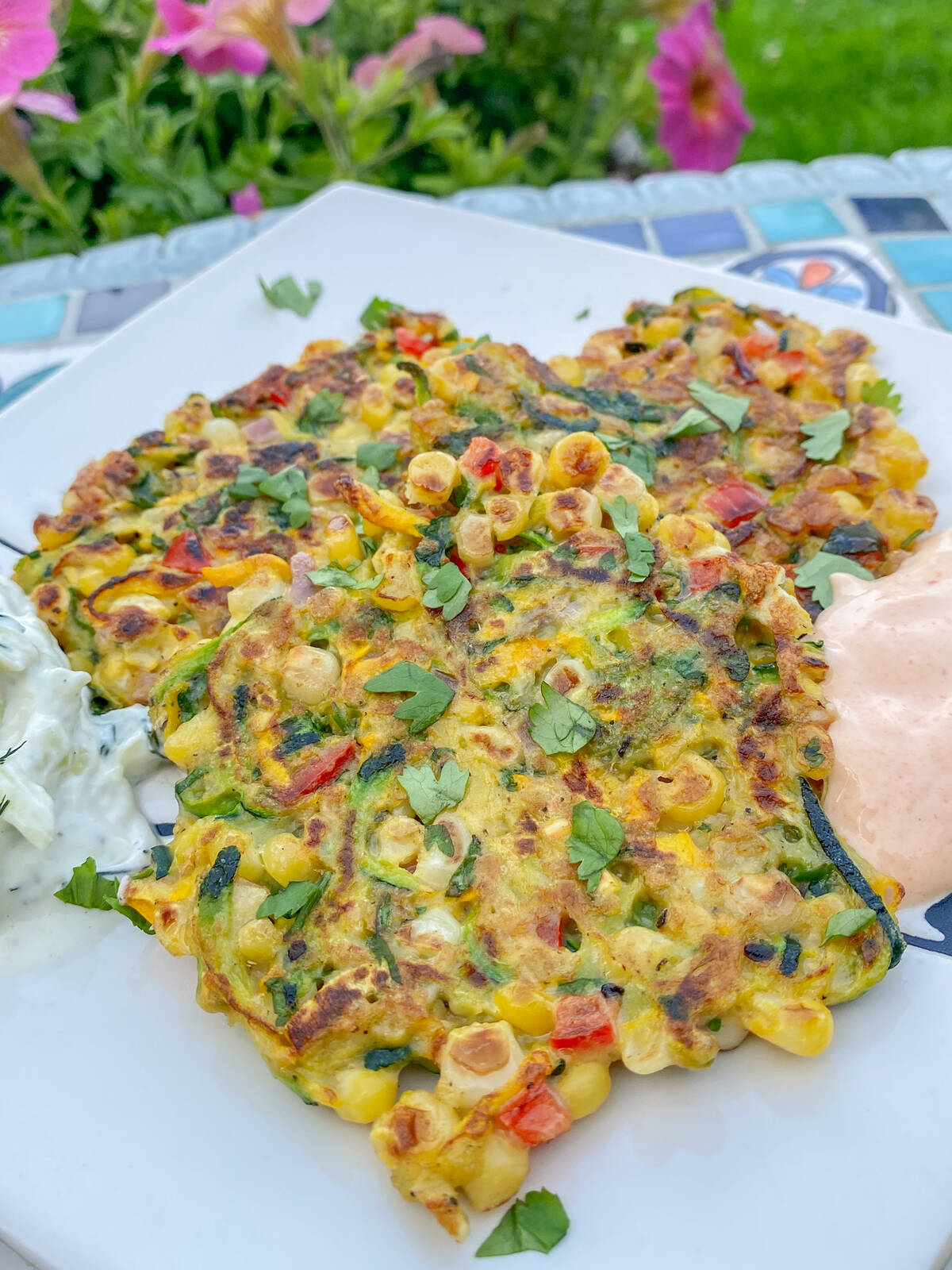 Zucchini corn fritters. Photo: Getty Stewart