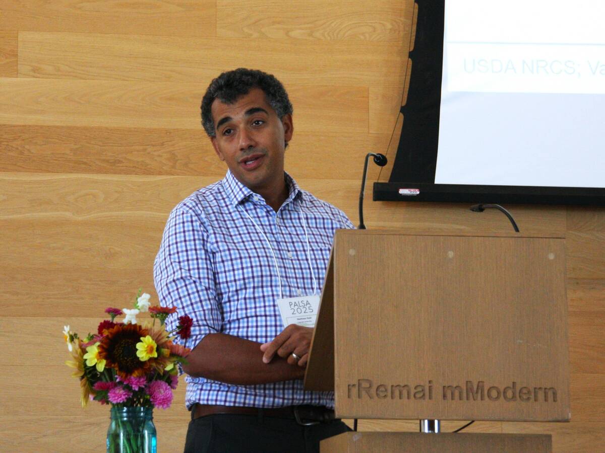 Matthew Reid of Cornell University, presents his work on tile drainage at the 2025 Pan-American Light Sources for Agriculture Conference in Saskatoon, Sask. Photo: Janelle Rudolph