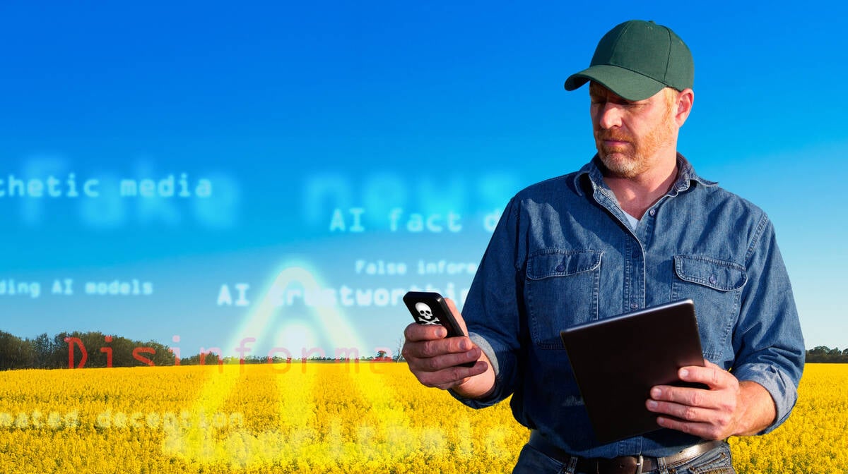 A royalty free image from the farming industry of a farmer in a canola field using a tablet computer and smart phone to surf the internet, check email or make a phonecall.