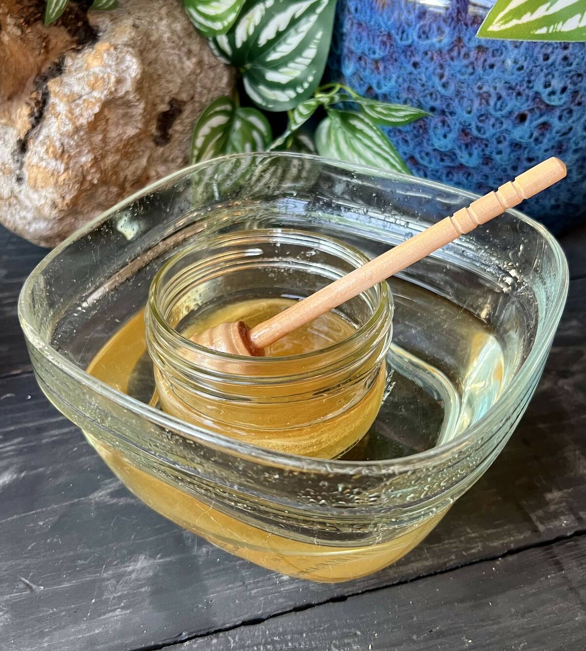 There’s no need to throw away crystallized honey. Reheating the jar in a bowl of hot water will dissolve the crystals and return the honey to liquid. Photo: Getty Stewart