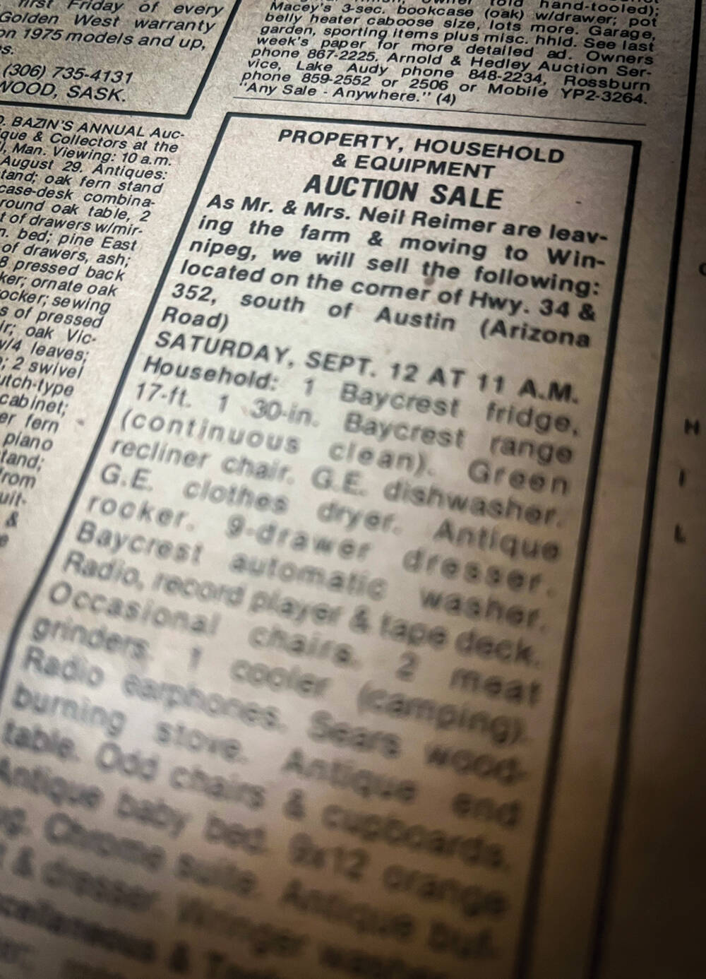 A farm auction ad running in an edition of the Manitoba Co-operator during the hard years of the ’80s and one of the images included in Geralyn Wichers’s award-winning piece on rural depopulation. Photo: File
