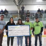 Representatives of the Yellowhead Community Recreation Centre accept $35,000 for heating improvements from HyLife Fun Days 2025.