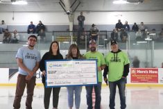 Representatives of the Yellowhead Community Recreation Centre accept $35,000 for heating improvements from HyLife Fun Days 2025.
