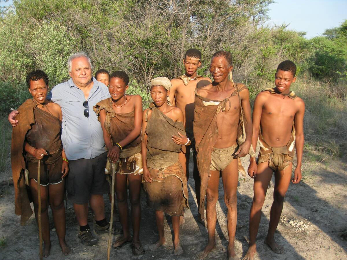 Philippe Sabourine with members of Indigenous African tribes in the Kalahari Desert. Photo: Submitted