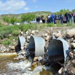 A 2017 tour, which highlighted an initial phase of the Manitoba Forage and Grassland Association's Aquanty project, stops at a water control structure in the Assiniboine-Birdstail watershed, one of the areas included in that first hydrological model. Photo: File