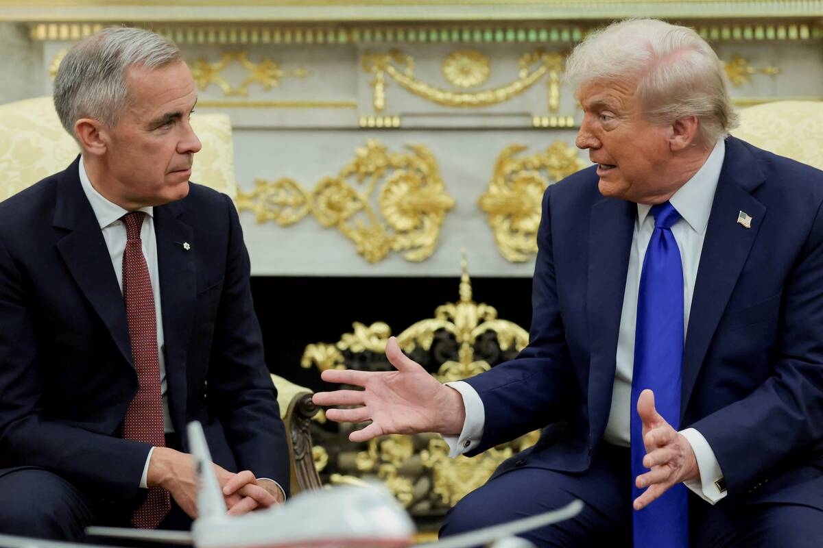 U.S. President Donald Trump and Canada's Prime Minister Mark Carney meet in the Oval Office at the White House in Washington, D.C., U.S., October 7, 2025. Photo: Evelyn Hockstein/Reuters