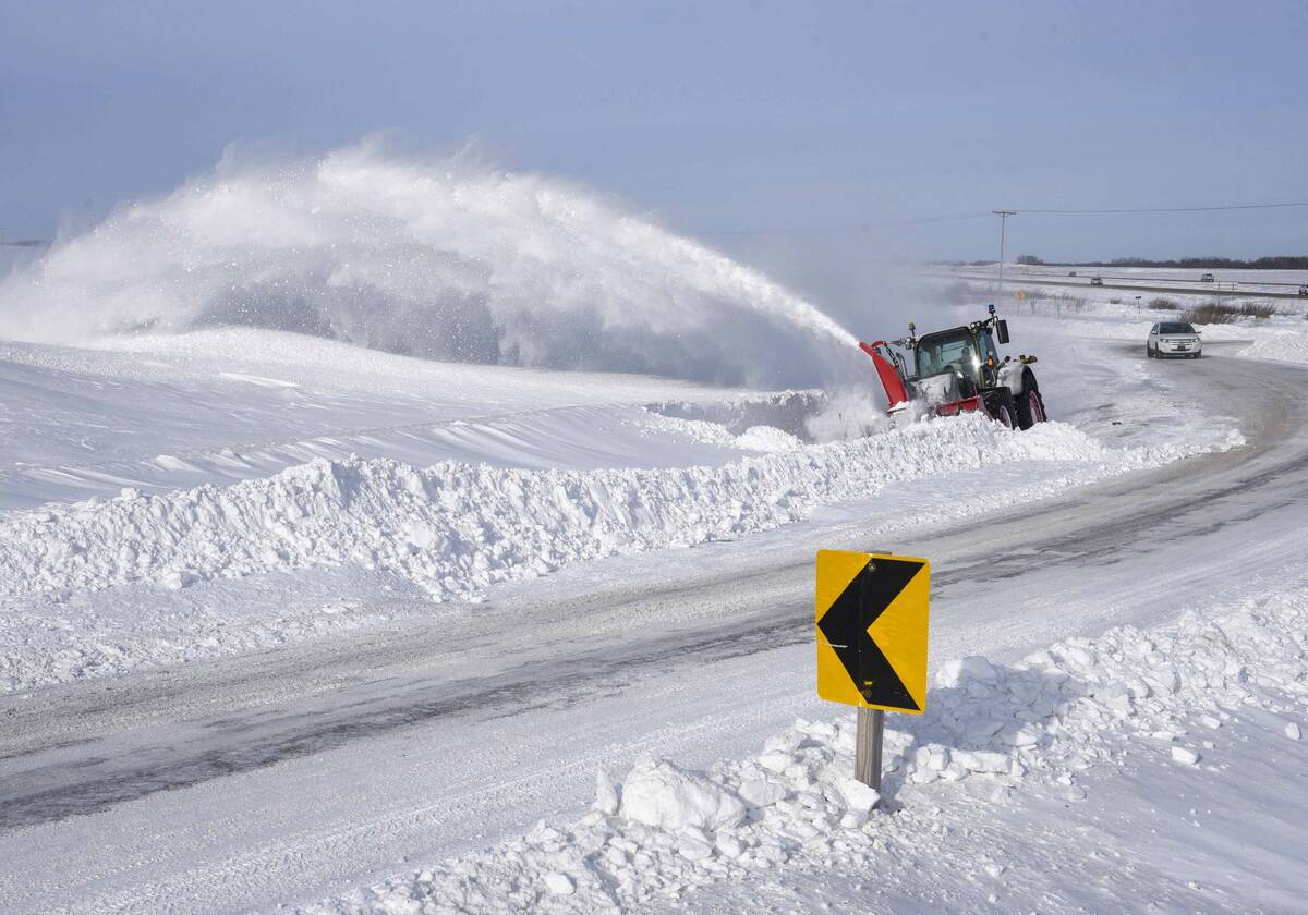 A tractor blowing snow in rural Saskatchewan. PHOTO: FILE
