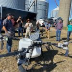 Adrian Rivard talks to attendees of a cover drop seeding demonstration near Embro. Photo: John Greig