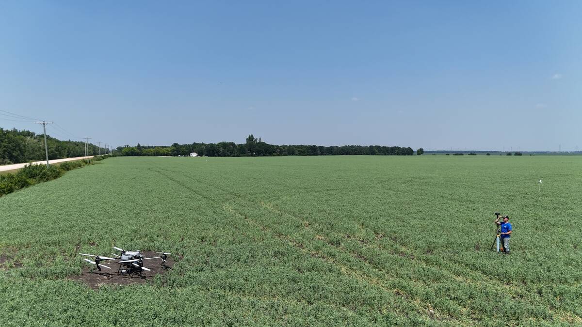Kevin Falk conducts drone research at EMILI’s Innovation Farms northwest of Winnipeg, Man. Photo: EMILI