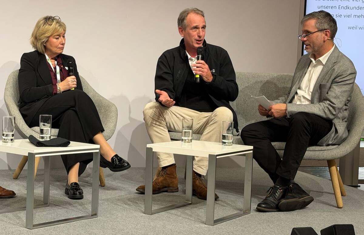 Donna Boyd, CEO of the Agricultural Manufacturers of Canada and Régis Legendre, owner of Lucas G were on a pane at Agritechnical, moderated by Guido Honer, of Landwirtschaftsverlag. Photo: John Greig