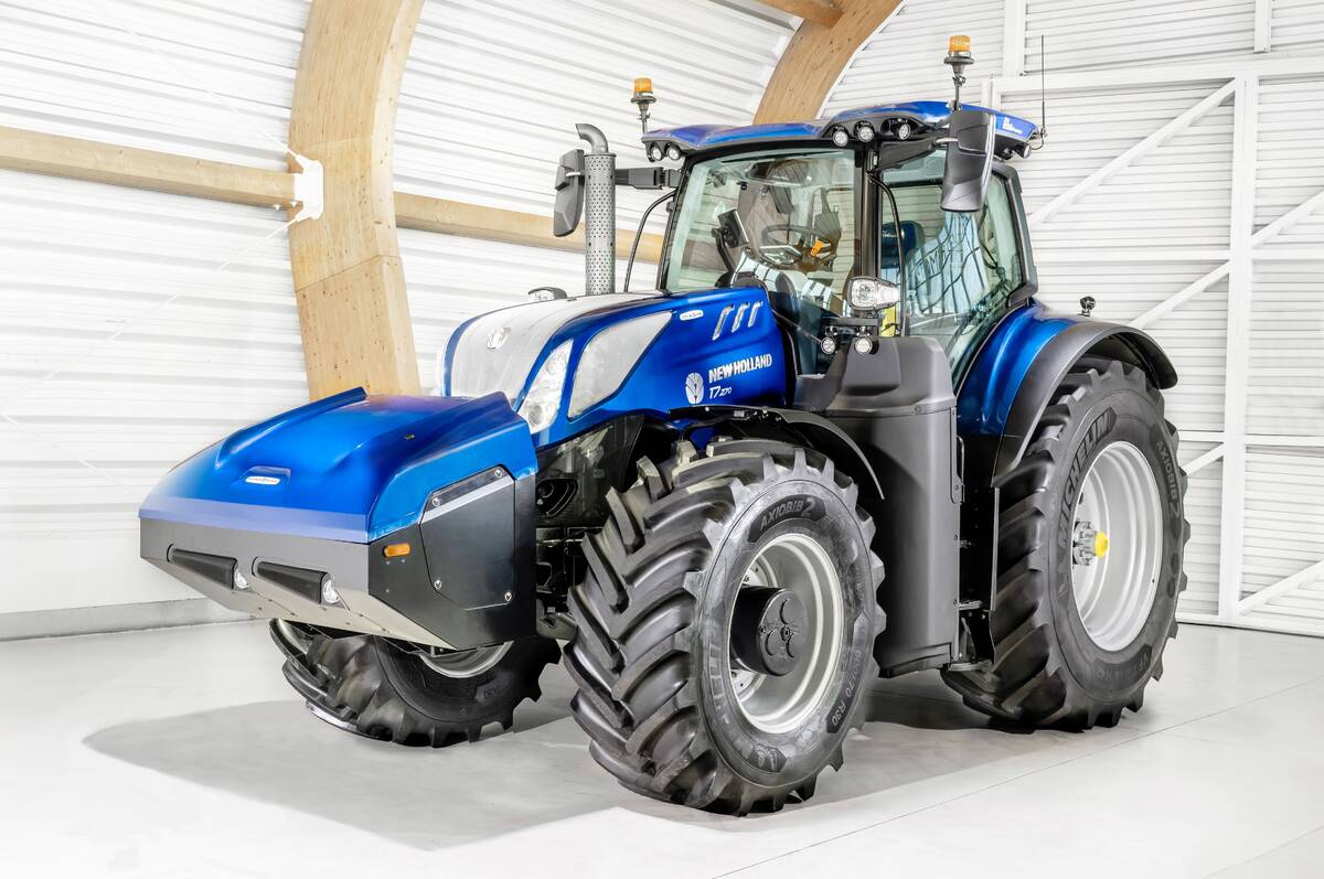 A new T7.270 tractor from New Holland is designed to run on methane or CNG. With an auxiliary front-mounted tank, the tractor has enough fuel onboard for roughly 11 hours of run time.  Photo: New Holland