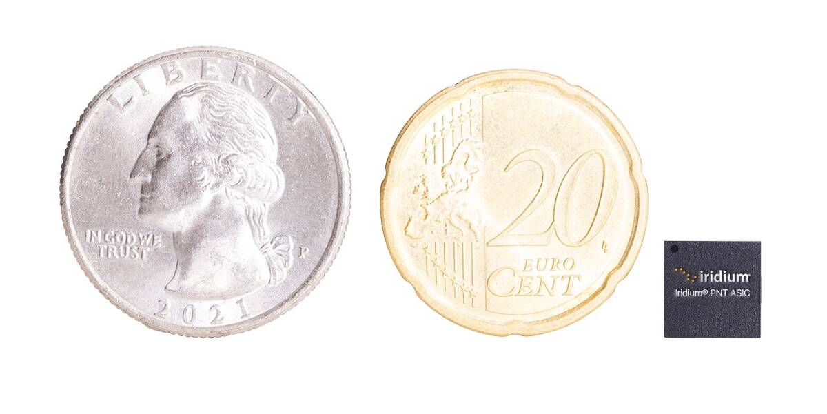 An American quarter and Euro 20 cent coin are compared with the tiny Iridium PNT ASIC chip. Photo: Courtesy Iridium