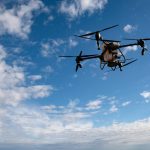 Agricultural drone spreading fertilizer on a newly planted field in Argentina. Smart farm. Photo: Cristian Martin/Getty Images Plus