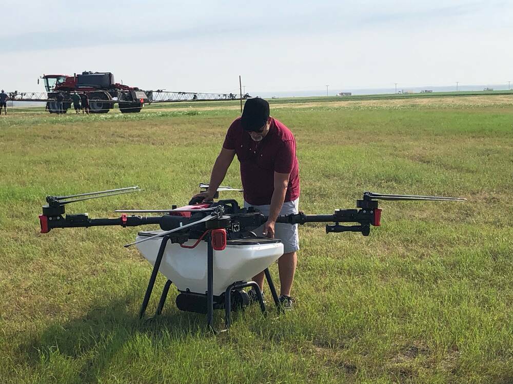 Drone spraying has garnered attention in Canadian agriculture but, with the exception of one recently approved fungicide, there are no pesticide labels that allow drone application for agriculture. Photo: File