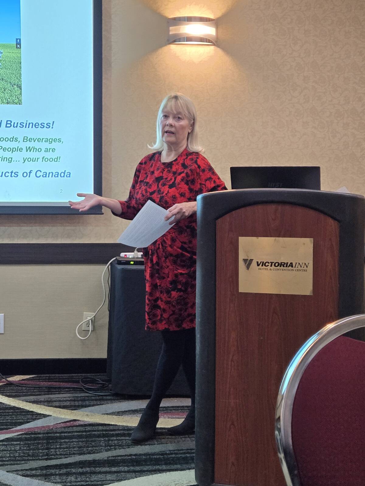 Economist and former provincial policy analyst Marnie Scott speaks about maple-washing in Canada’s grocery stores at the Manitoba Farm Women’s Conference in Brandon on Nov. 19, 2025. Photo: Miranda Leybourne