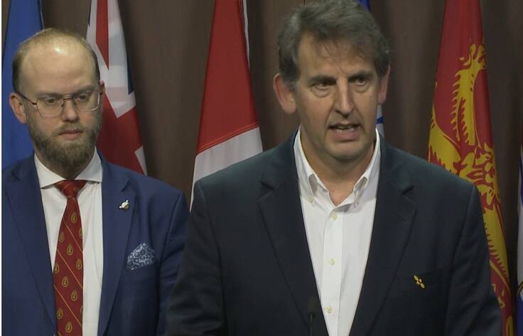 Peter Awram, director of the Canadian Beekeeping Federation, speaks to an Ottawa press gallery about Canadian beekeeper challenges Nov. 25. Arnold Viersen, the Alberta MP for Peace River &ndash; Westlock who introduced a motion to Parliament about what the sector needs &mdash; is pictured left. Photo: Screen capture